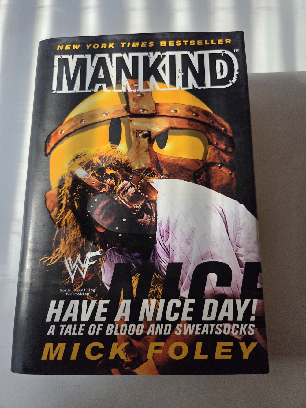 Mankind: Have A Nice Day! Hardcover - Black & Yellow Cover